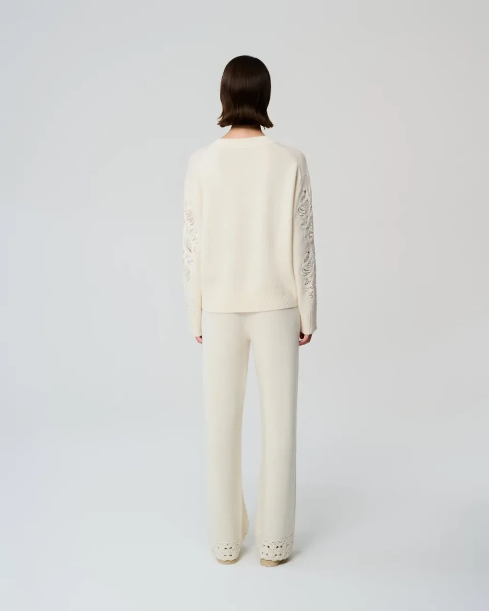 Maglia con maniche ricamate