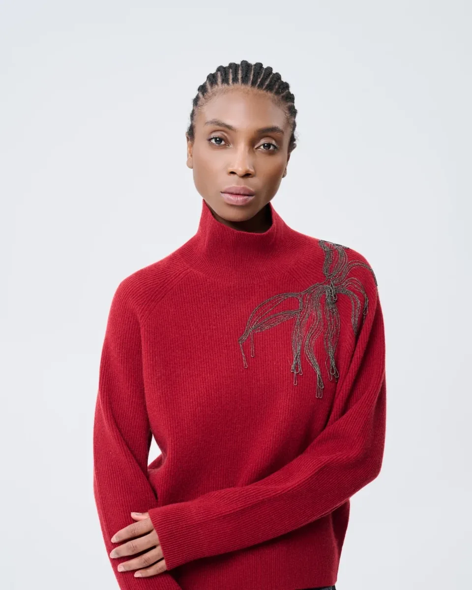 Maglia rossa con motivo botanico