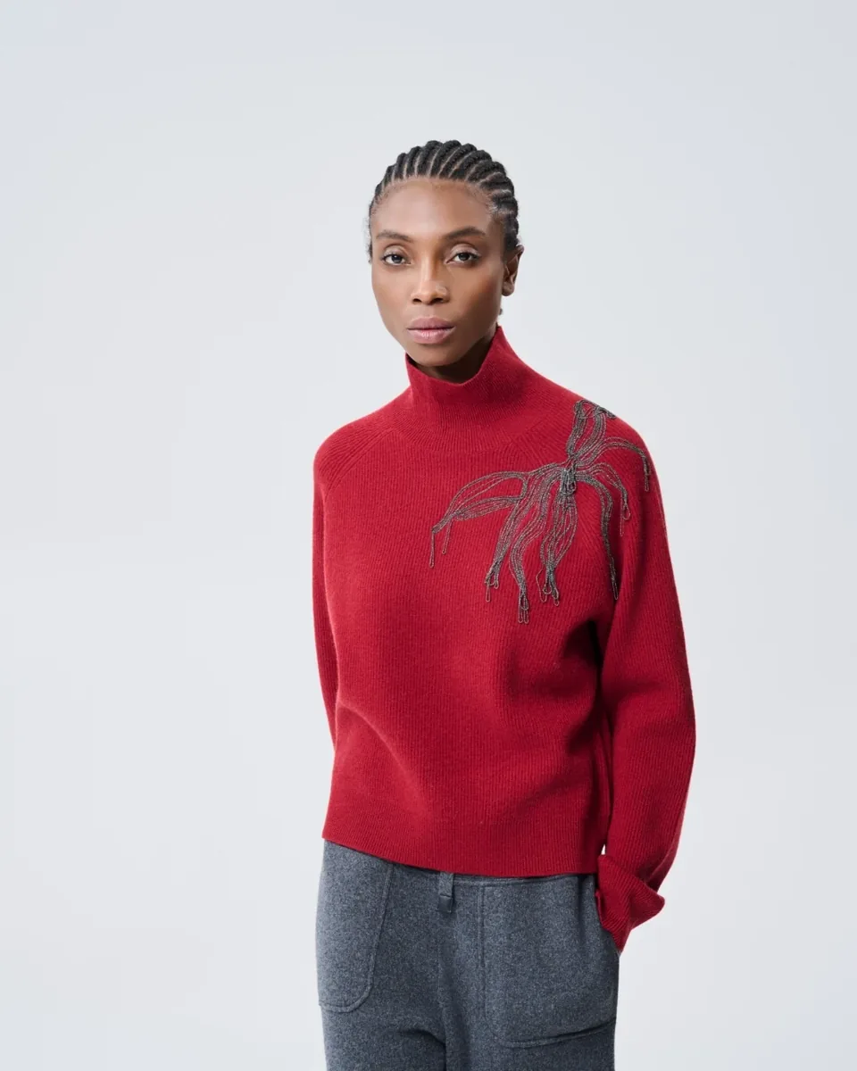 Maglia rossa con motivo botanico