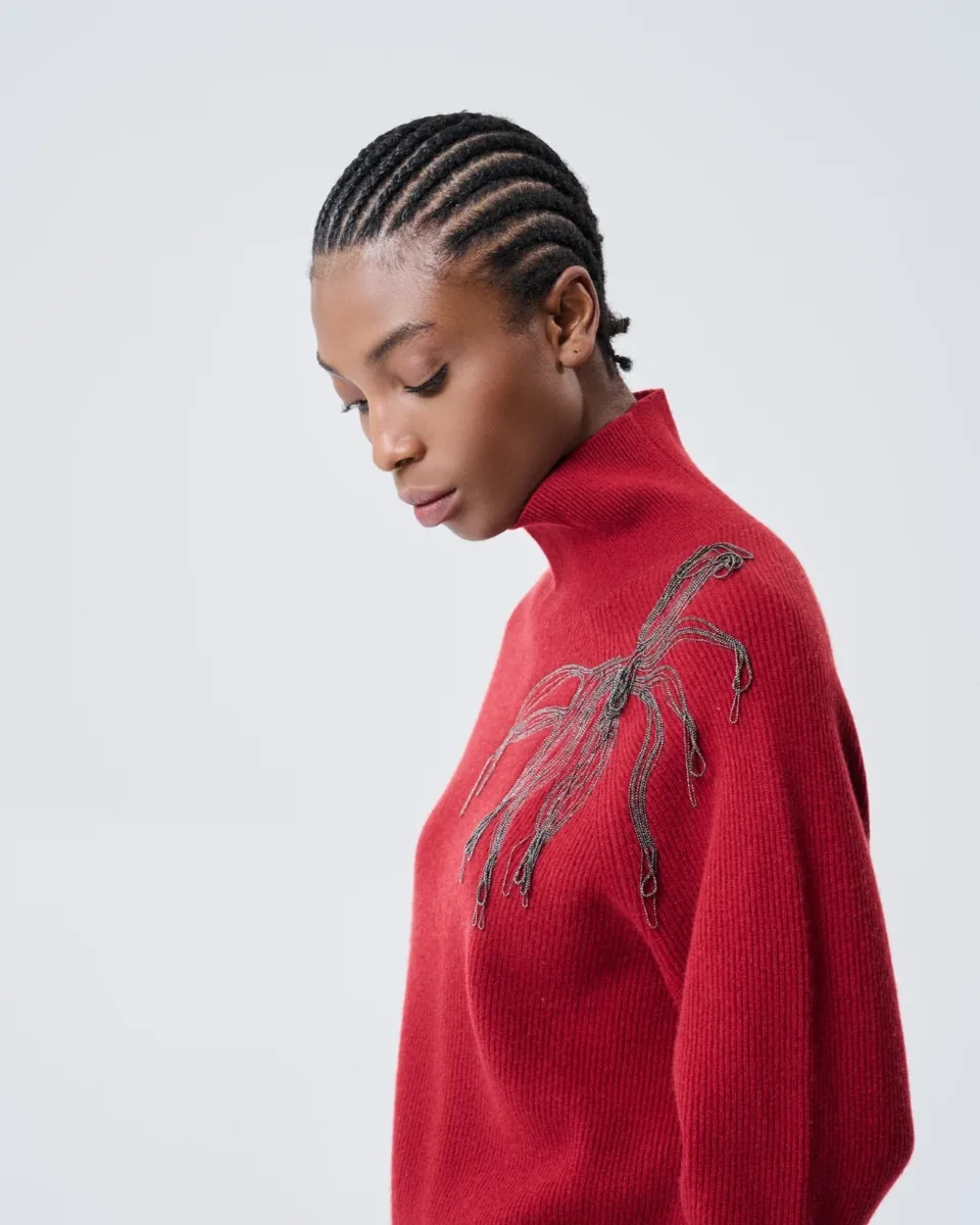 Maglia rossa con motivo botanico