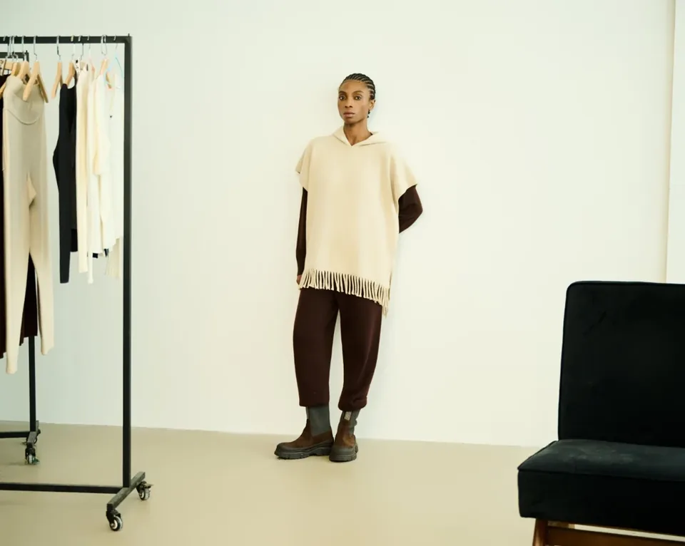 Top in maglia con frange