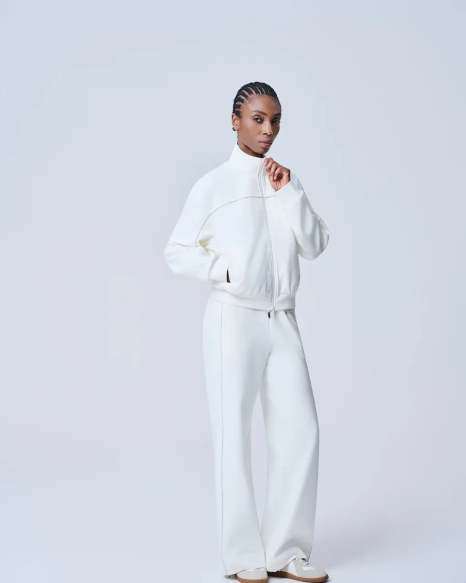 Giacca in maglia bianca con zip frontale