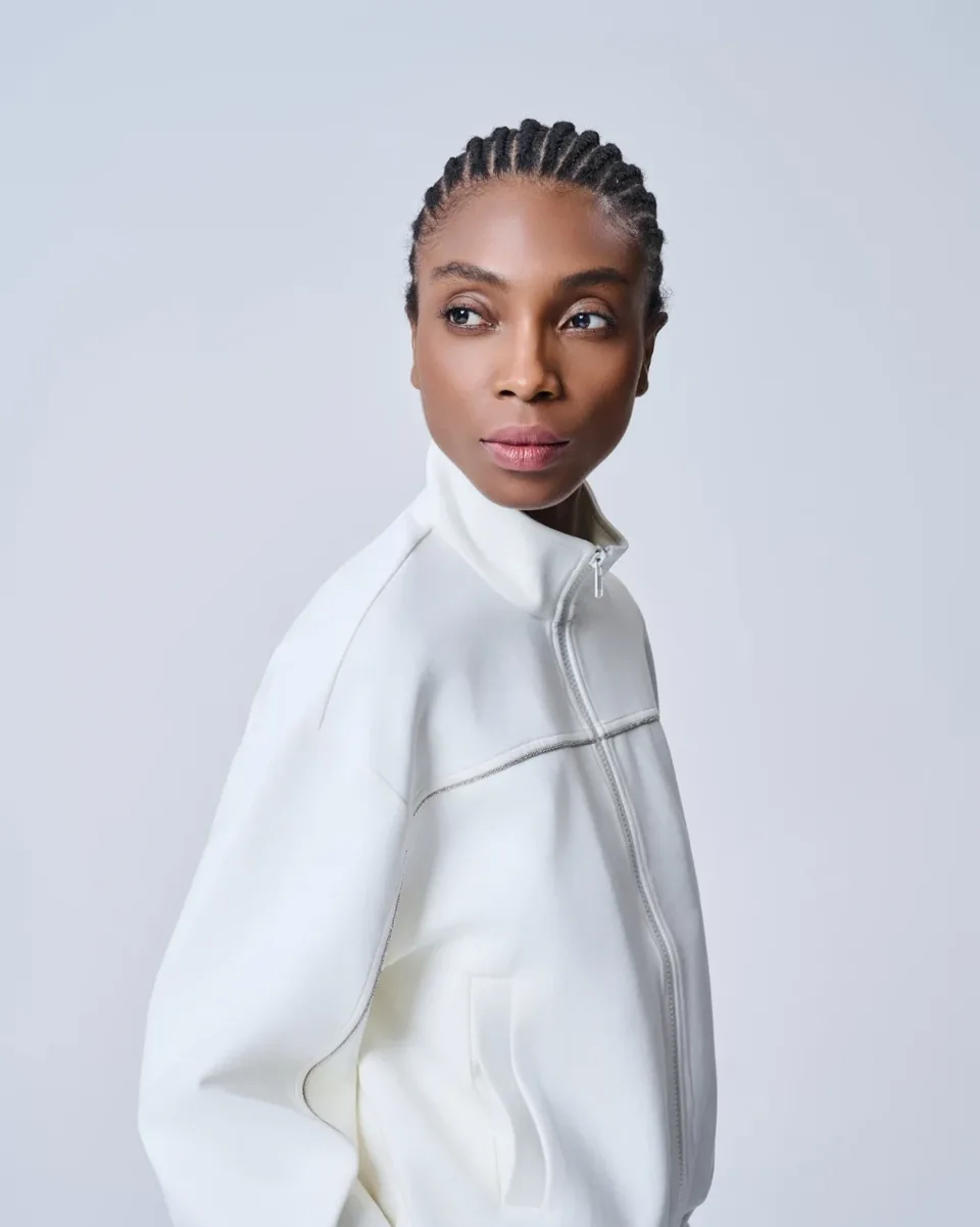 Giacca in maglia bianca con zip frontale