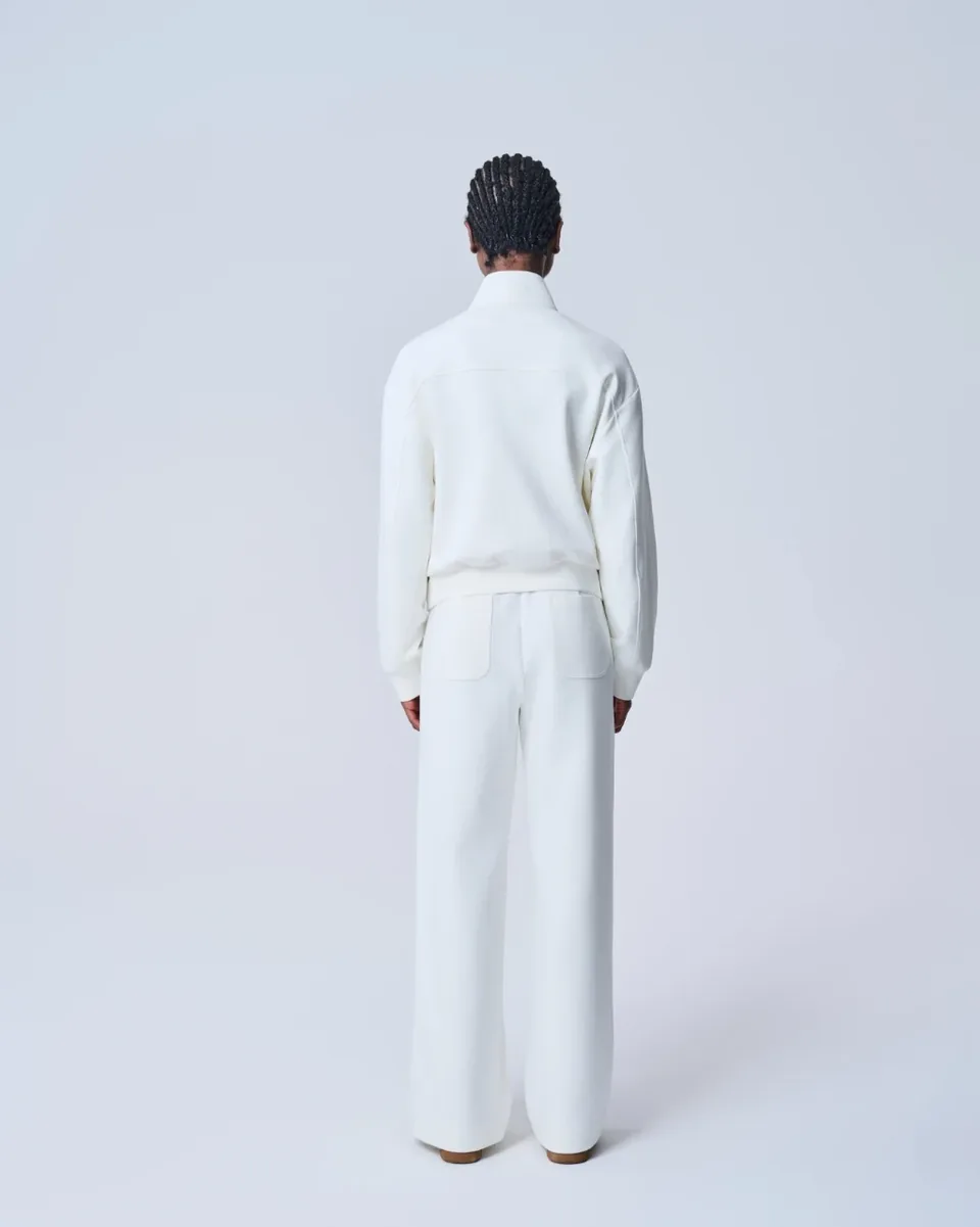 Giacca in maglia bianca con zip frontale